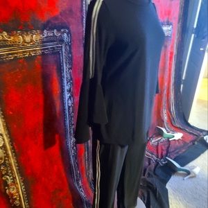 Black pant suit with white sparkle strpes on the side